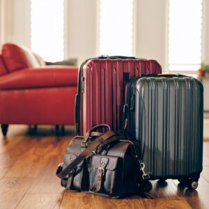 Hotel Deal Finder product image: packed suitcases ready for a trip, clean copy space